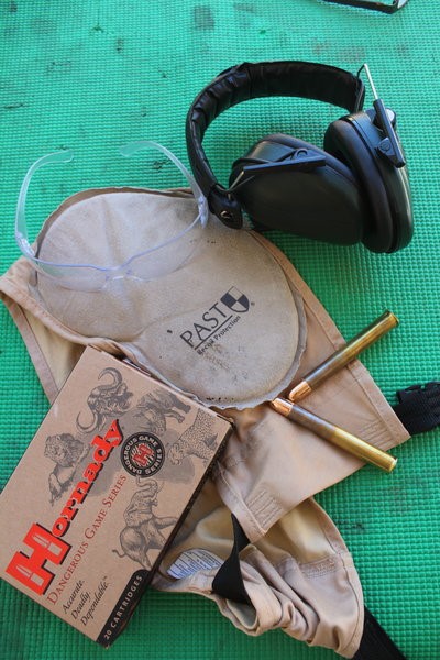 shooting ear protection, eye protection, ammunition, and recoil shield